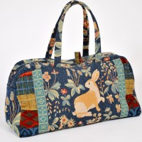 Rabbit travel bag by Bernadette Erskine-Hornyold