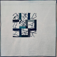 Megan Arnold - Modern quilt depicting clients life and relationship through maps of where they lived.