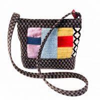 Bernadette Erskine-Hornyold - Overnight and crossbody bag in patchwork jacquards in vibrant tones.