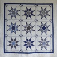 Blu and White Patchwork quilt by Megan Arnold